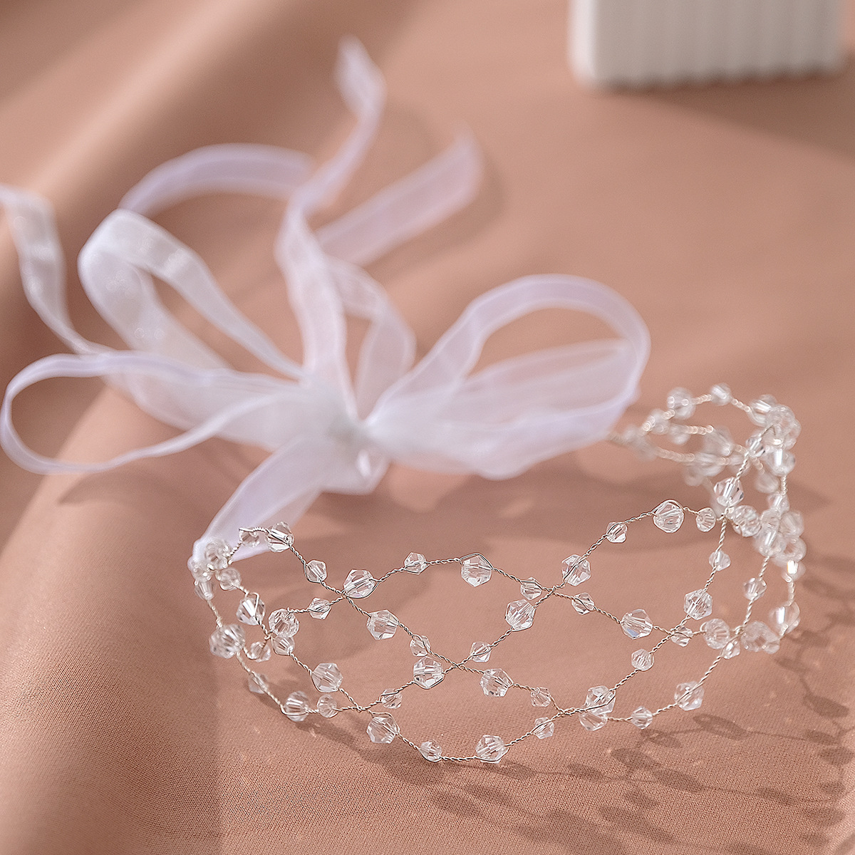 A new retro crystal hair band from Europe and America, a fashionable and versatile bridal headwear. Handcrafted beaded grid crystal wide hair band for women details Picture