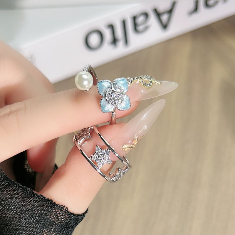 French champs-style gradient enamel four-leaf clove open ring for women, simple hollowed-out star geometric personalized index finger ring full figure