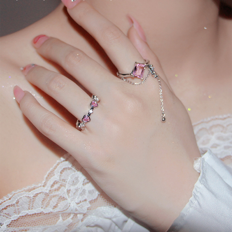 A pink zircon heart-shaped ring with square tassels and chain opening, a light luxury ring for women in INS 2022 new style details Picture