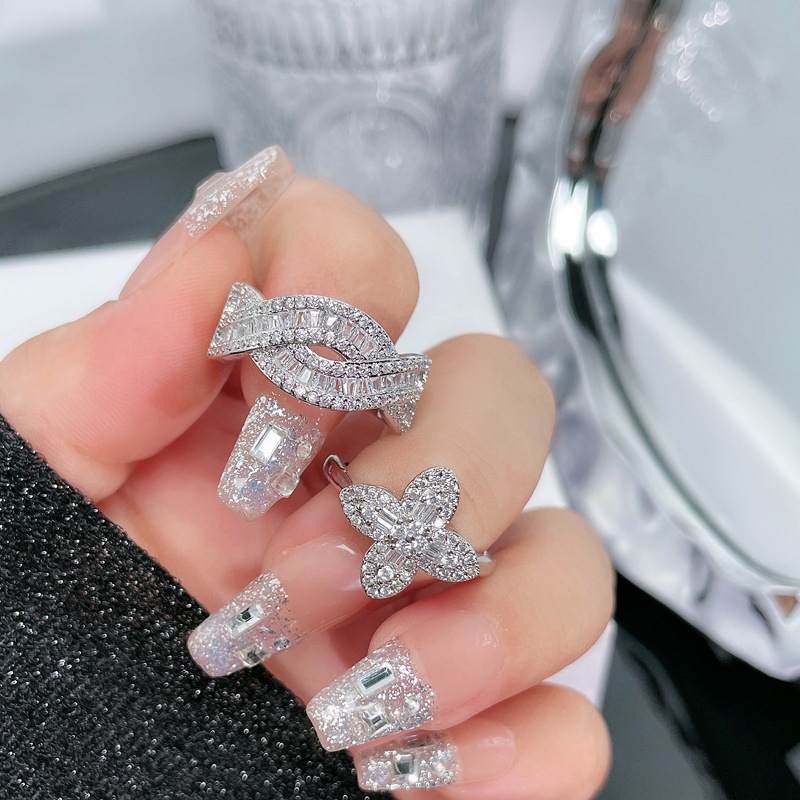 A light luxury, full diamond ladder, square row diamonds, cross-stacked open ring, a female four-leaf clover, elegant and high-end, cold style ring full figure