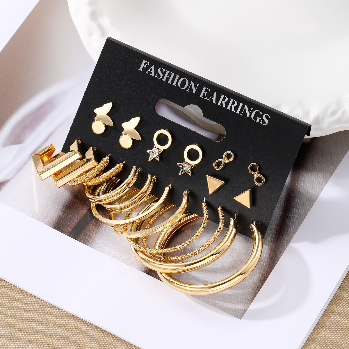 New cross-border alloy butterfly set earrings, fashionable and individual 8-shaped star butterfly circle earrings, 12-piece gold set Application Scenario