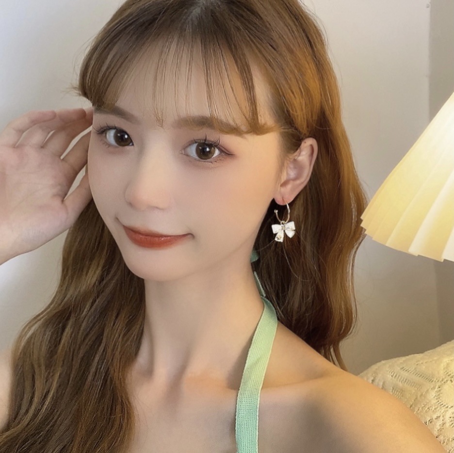 S925 Silver Needle Korean bow ear ring earrings, trendy and niche design, simple and elegant, goddess-like style stud earrings Application Scenario