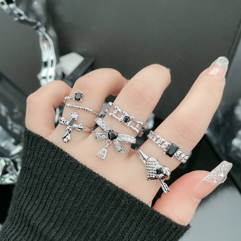 A unique dark bow, heart-shaped cross, black diamond open ring, a women's niche design, light luxury and versatile index finger ring details Picture