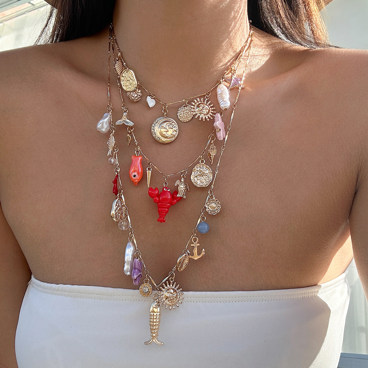 European and American cross-border jewelry, personalized bow imitation pearl necklace, layered style beach alloy pendant necklace full figure