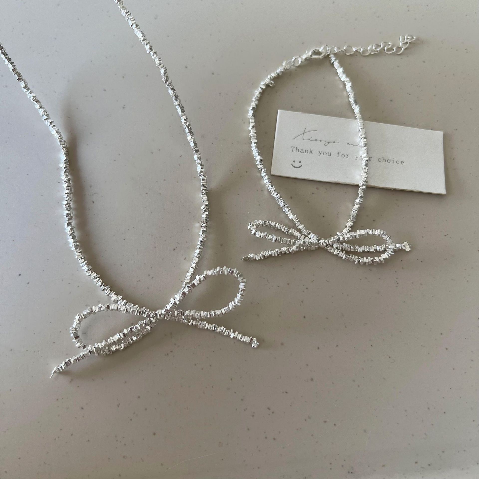 Super fairy fine glittering silver bow necklace for women, light luxury, elegant and sweet, fashionable and versatile neckchain, collarbone chain Application Scenario