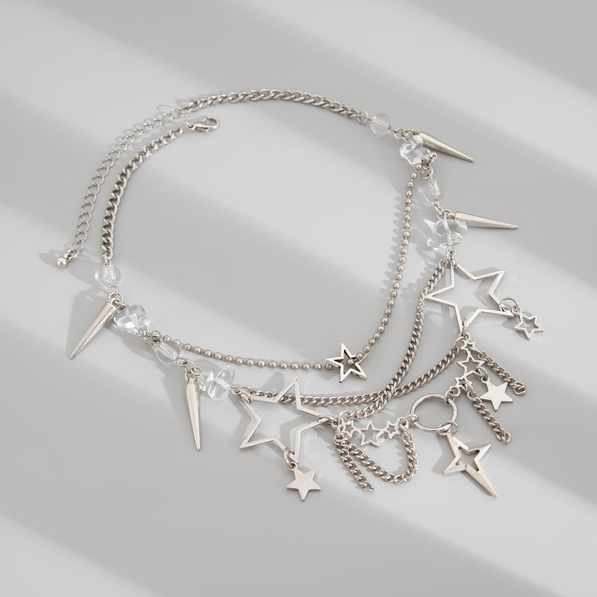 European and American cross-border jewelry: cold style five-pointed star alloy pendant Necklace with irregular tassels Necklace multiple layers Application Scenario
