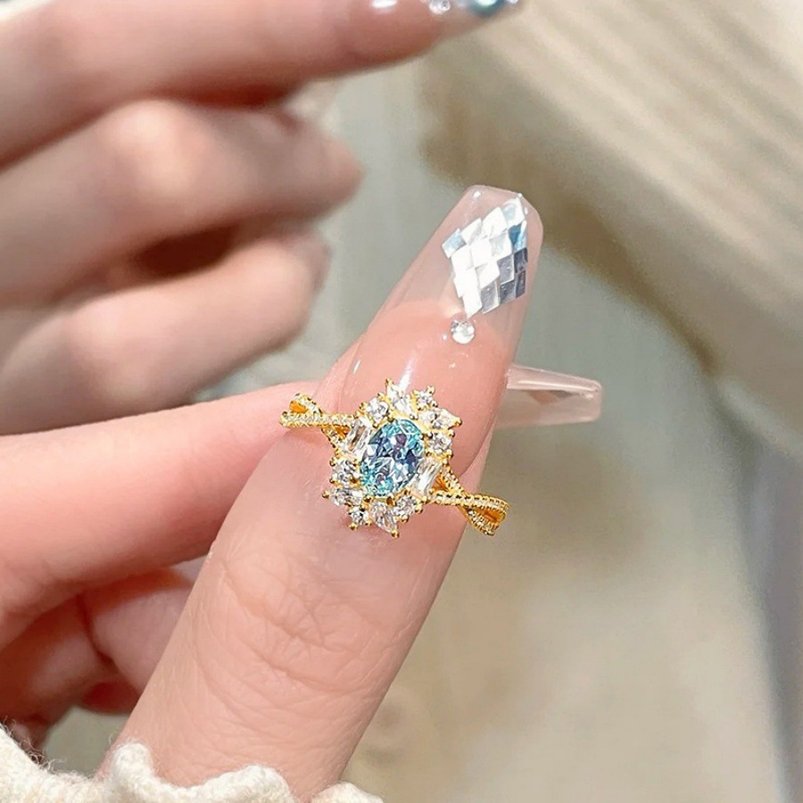 The court retro style hollowed-out lace ice flower cut blue pigeon egg ring is feminine, light luxury and high-end ring trend details Picture