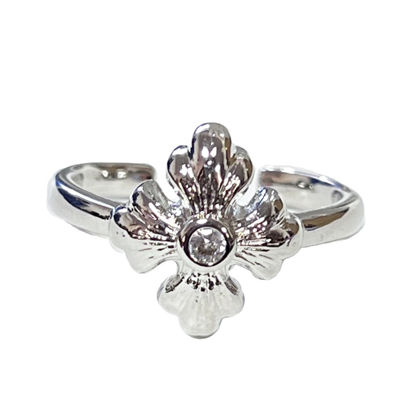 A simple and fashionable iris cross open ring with a cold and elegant style for women, exuding a sense of luxury and sophistication. It's a niche index finger ring Item Picture