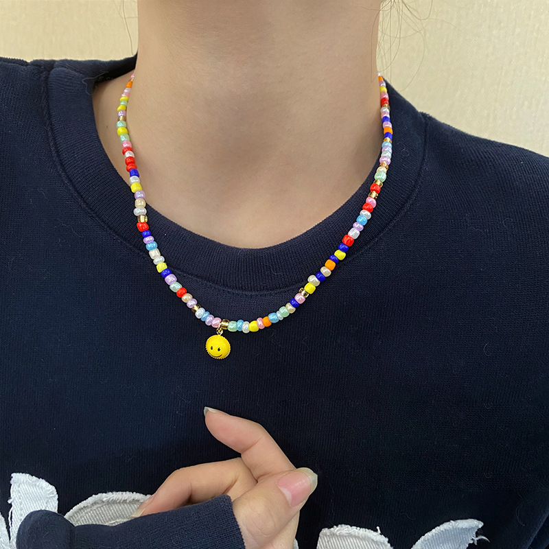 The 2023 new style of colorful beaded smiley face necklace for women, a niche collarbone chain design, and a hot girl hoodie accessory Application Scenario