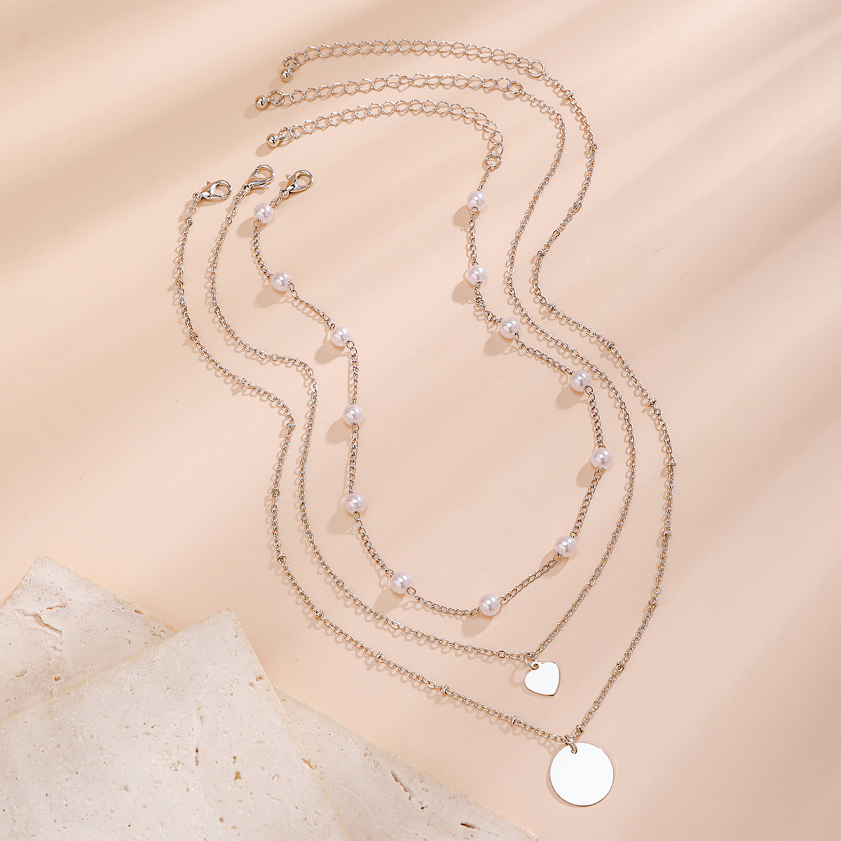 European and American cross-border jewelry multi-layer chain cold style necklace, simple imitation pearl geometric round piece sweet and cool necklace Application Scenario