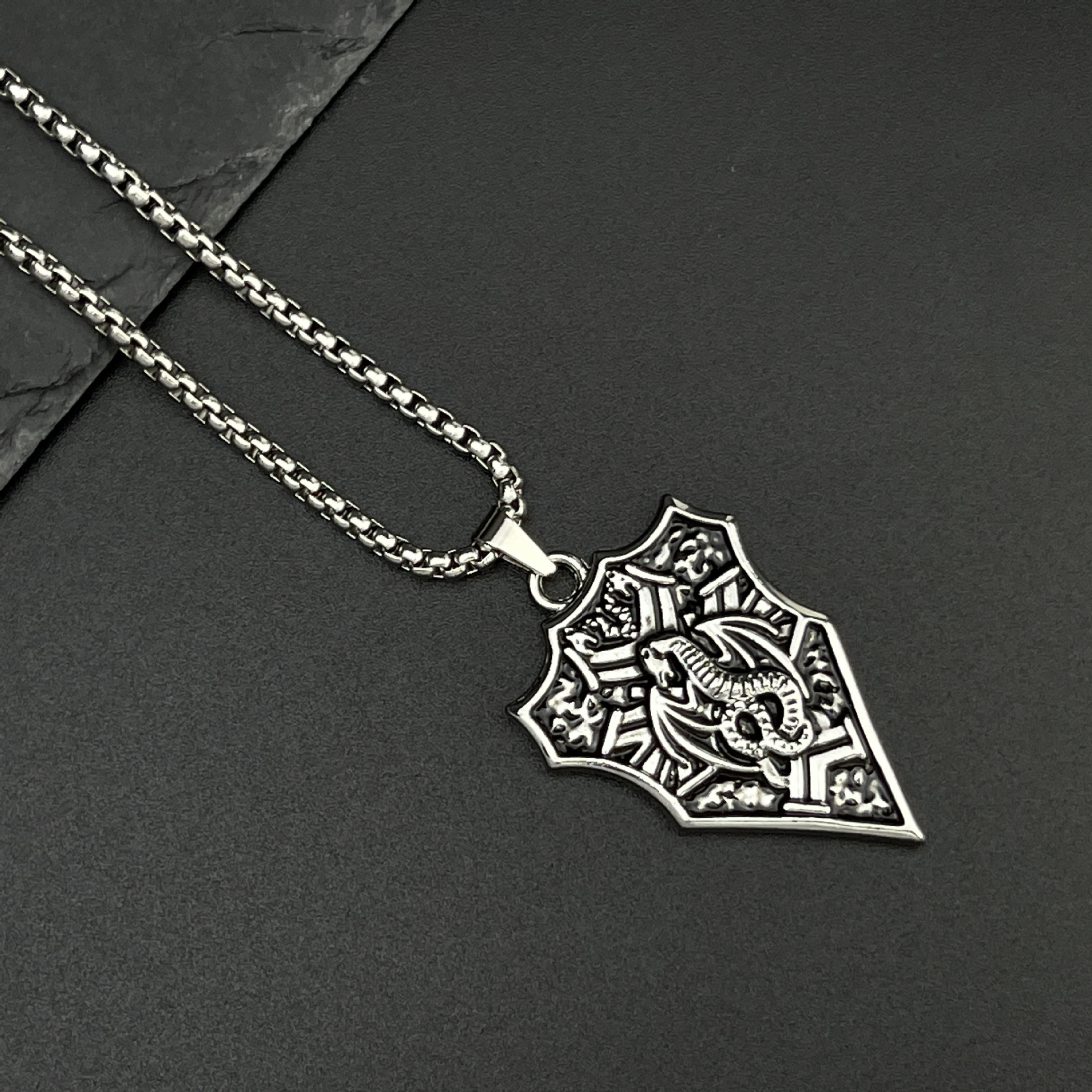 Wholesale of new cross-border European and American retro dragon shield necklace, fashionable, creative and individual hip-hop style titanium steel necklace Application Scenario