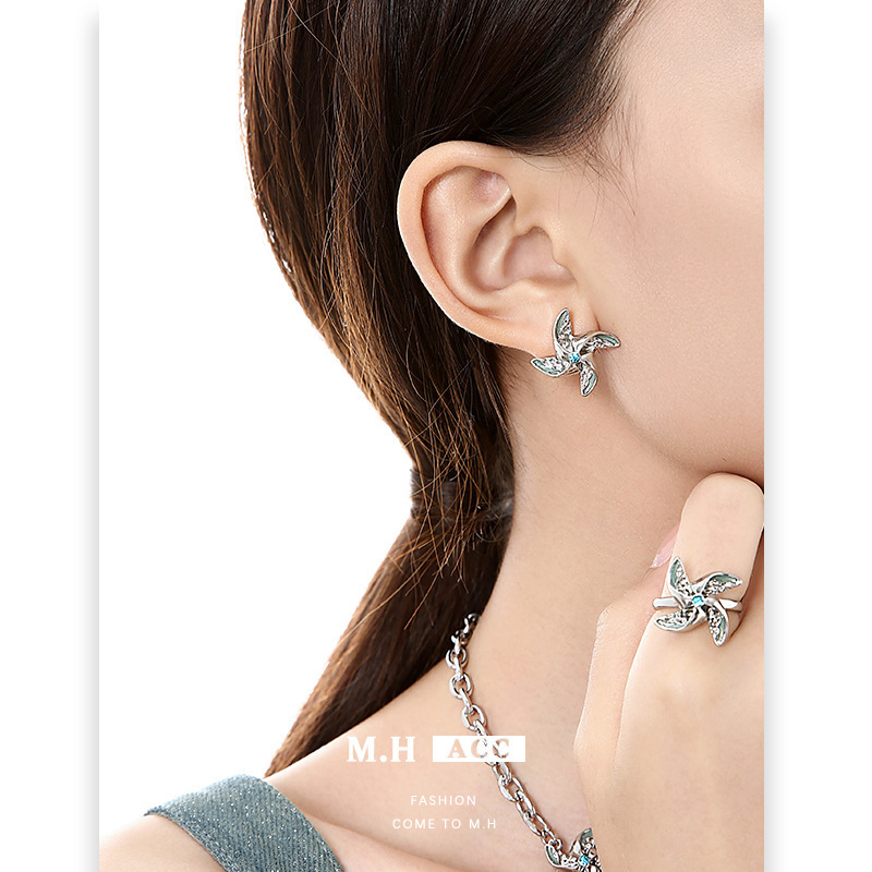 Childlike windmill asymmetrical earrings, women's light luxury ins school style fashionable stud earrings, high-end feel, 925 silver needle earrings details Picture