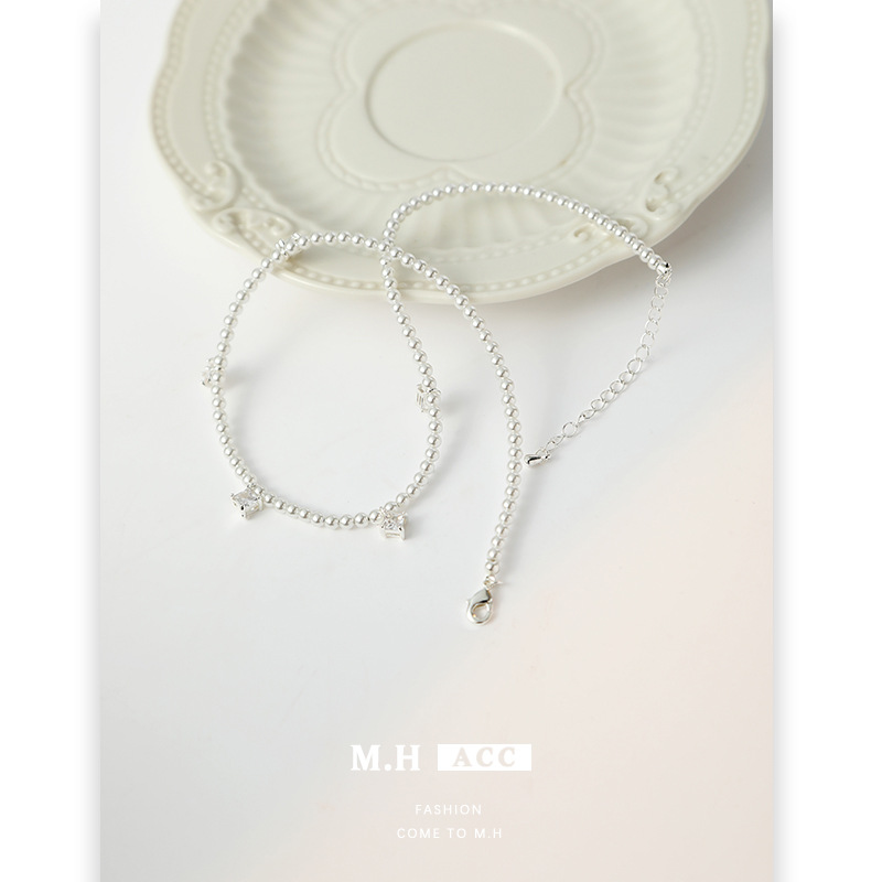 The new design of the star-shaped tassel pearl necklace for women, with a Korean style and ins style, is simple, fashionable and versatile. Wholesale of collarbone chains Application Scenario