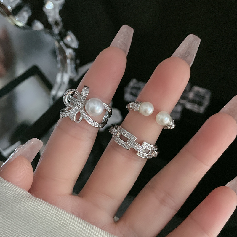 A light luxury and high-end bow pearl open ring for women on Instagram, a cold style, a niche sweet and cool temperament, and a trendy food ring trend Specification drawing