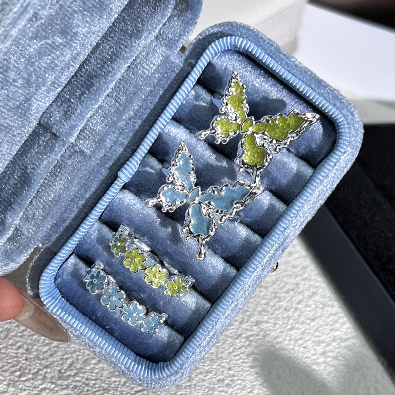 A new, fresh and simple layer-and-wear three-dimensional lava butterfly ring, a cold and elegant enamel index finger ring with a feminine flower texture Specification drawing