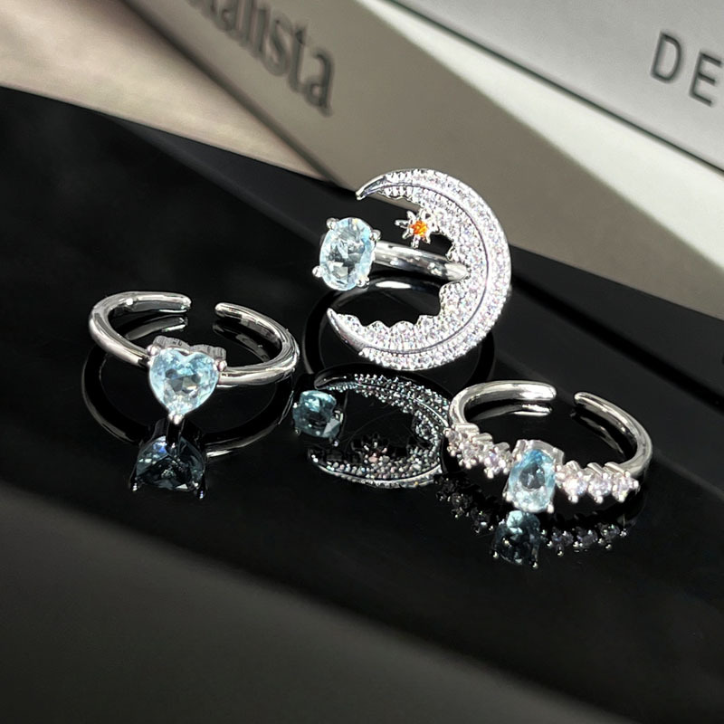 A simple and individual open ring with a blue diamond moon, a cold and fashionable style for women, and a unique and elegant index finger ring Application Scenario