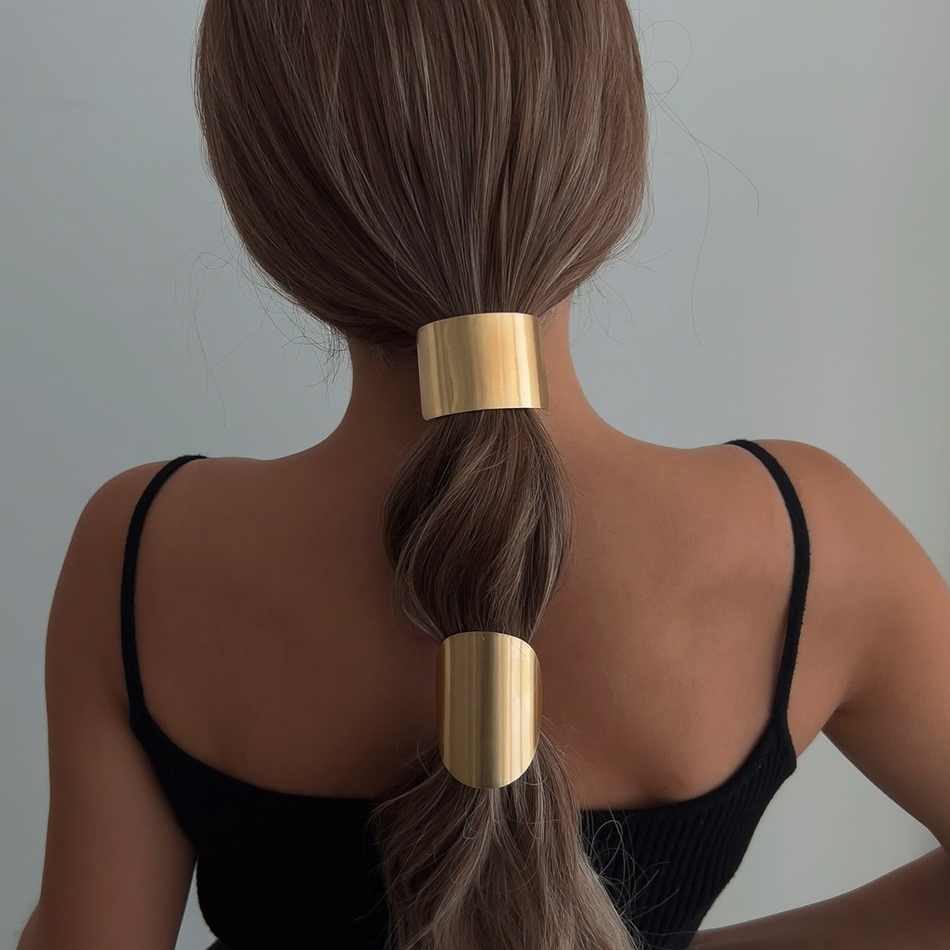 Wholesale of popular hair accessories on AliExpress, including metal hair ties for the back of the head and ponytail, as well as high-end exaggerated geometric cross-border hair ties full figure