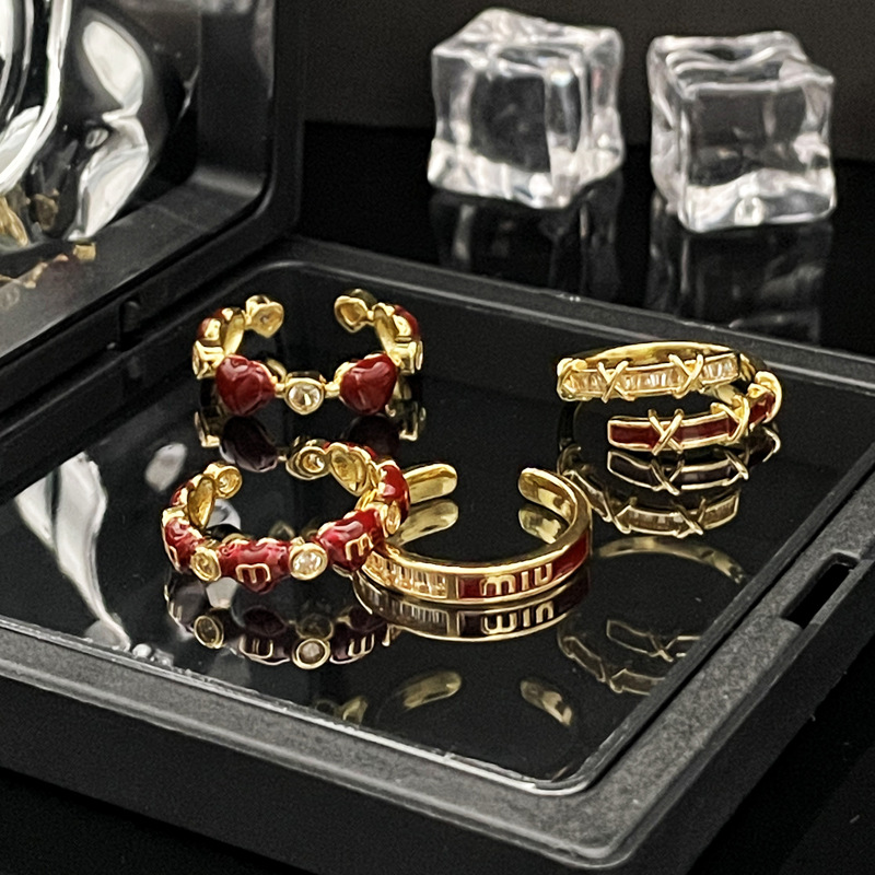A retro new red glazed heart-shaped opening ring for women, with a unique, light luxury and high-end feel. It's sweet, cool and versatile full figure