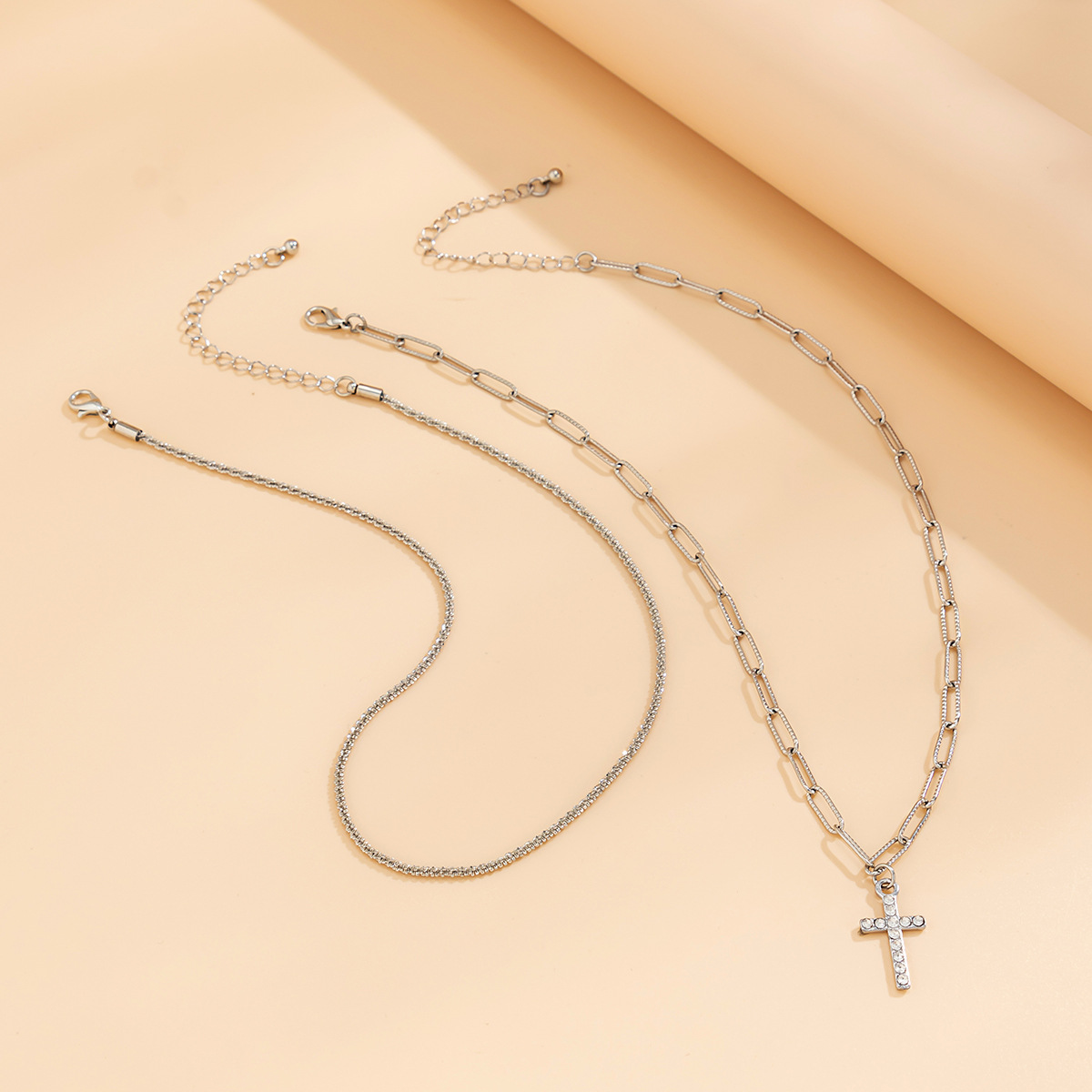 A versatile, sparkling chain collarbone necklace for women with tassels and diamond-encrusted crosses Application Scenario