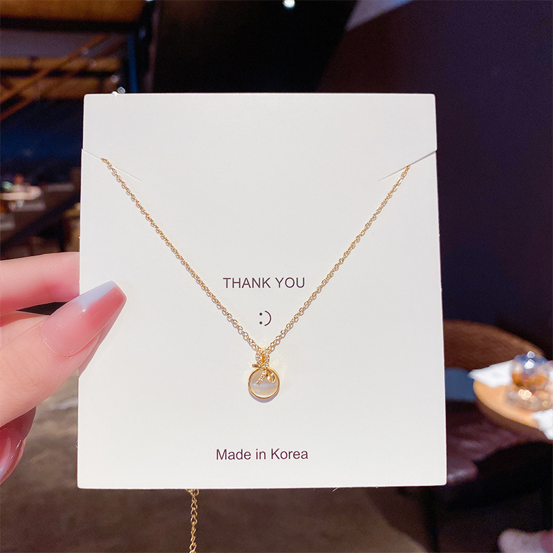 Korean internet-famous bow necklace for women, a simple and trendy titanium steel brand with a unique design sense. Wholesale of cat's eye stone collarbone chain Specification drawing