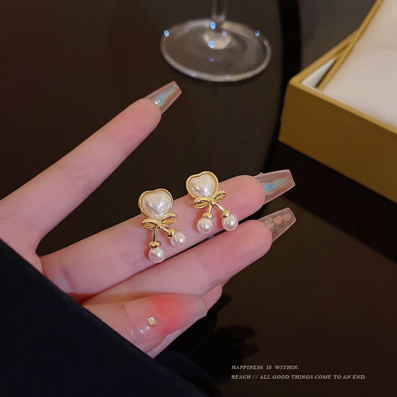 Autumn and winter bow heart-shaped cat's eye stone earrings for women, 2025 new trendy and fashionable earrings, high-end and light luxury stud earrings Specification drawing