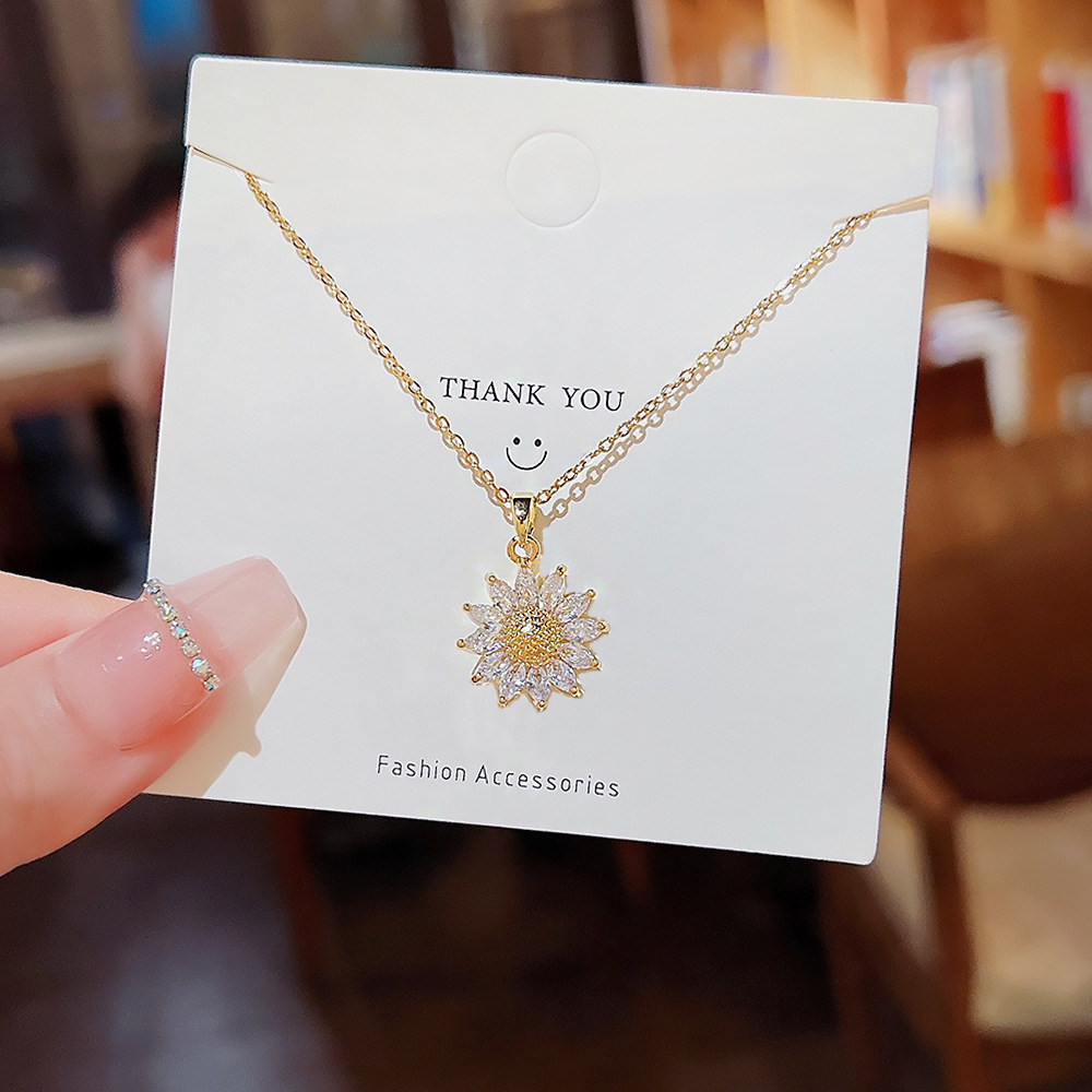 The new Zircon sunflower titanium steel necklace for women in 2025 features a niche design sense, a fashionable and high-end collarbone chain full figure