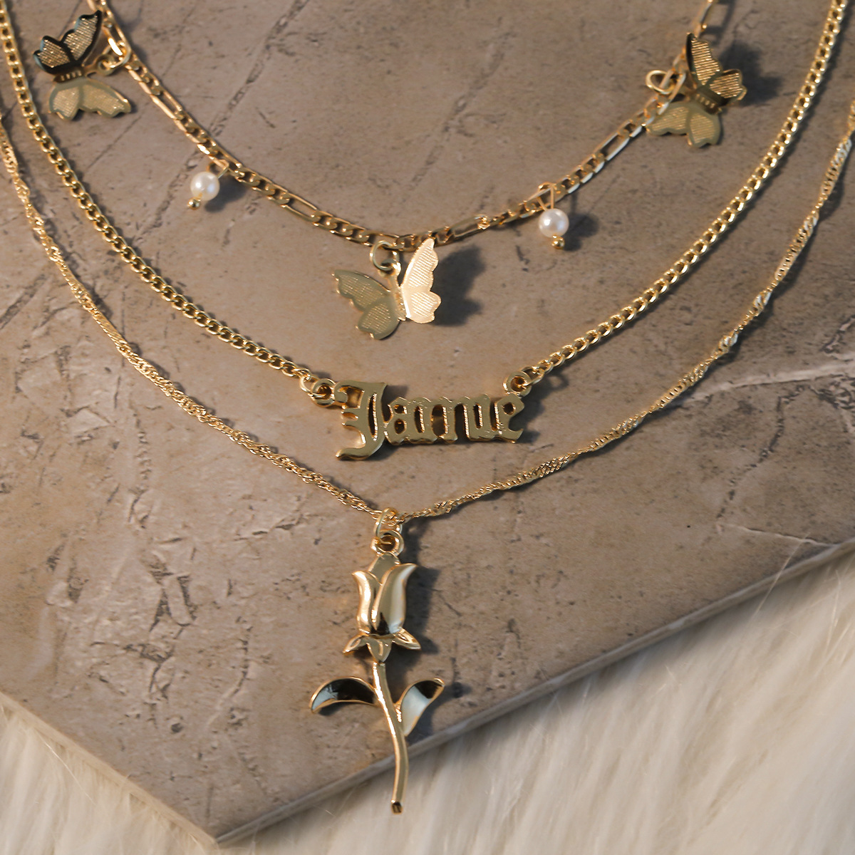 European and American cross-border jewelry, personalized floral hollowed-out letter necklace, retro mixed rose butterfly necklace Application Scenario