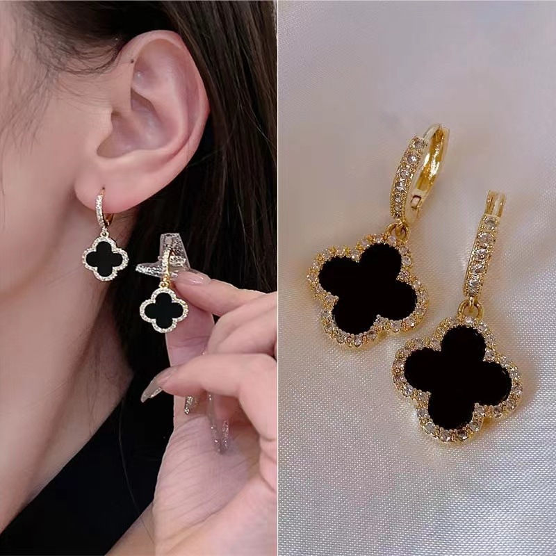Four-leaf Clover earrings, a new style of trendy and exquisite micro-inlay ear rings in 2025, are popular and niche, with a sense of high-end design for women full figure