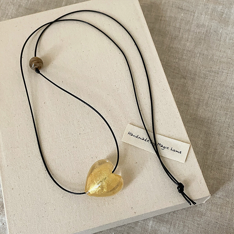 A niche and simple glass heart-shaped long leather rope necklace for women's personality on Instagram ~ Elegant, fashionable and versatile necklace sweater chain Application Scenario