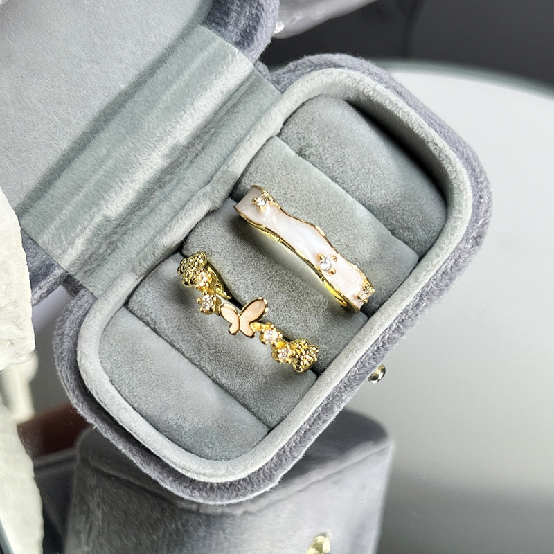 The new 2024 trendy minimalist drip glaze open ring is a niche design for women, exuding a sense of sophistication. It's a sweet and cool butterfly fashion ring Specification drawing