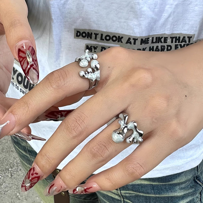Irregular liquid melting oil drip open ring, a niche design for women, with a high-end and cold style, fashionable and individual ring full figure