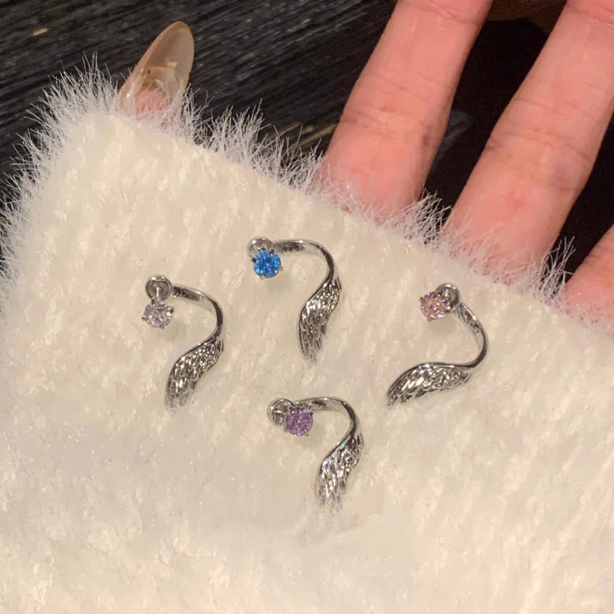 The stunning angelic wing ear stud earrings and earrings are unique and niche in Instagram Application Scenario