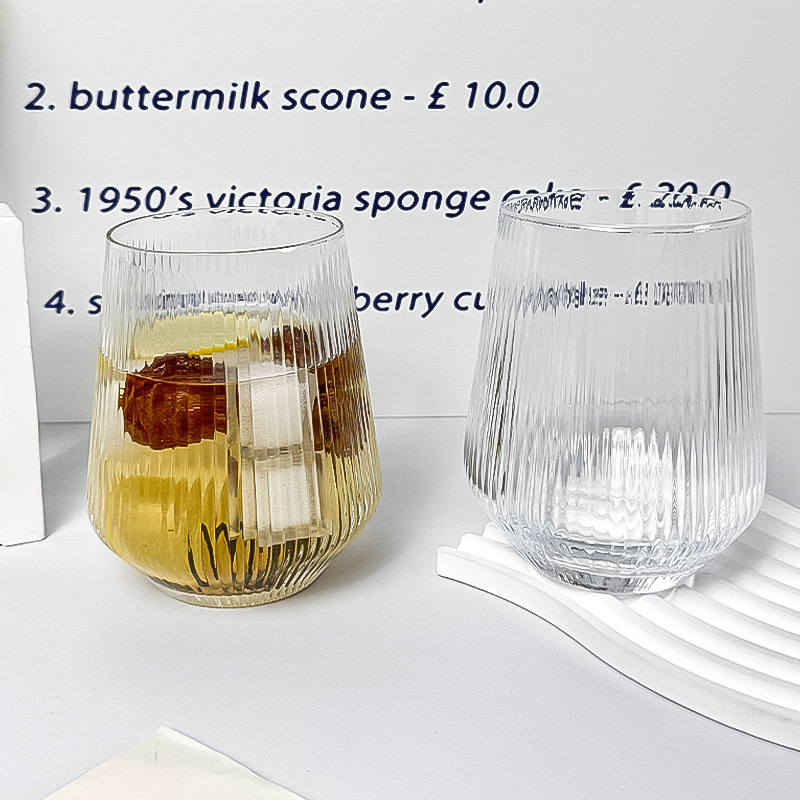 Wholesale of creative striped glass cups, household light luxury high-end water cups with high appearance standards, hotel commercial coffee cold brew cups full figure