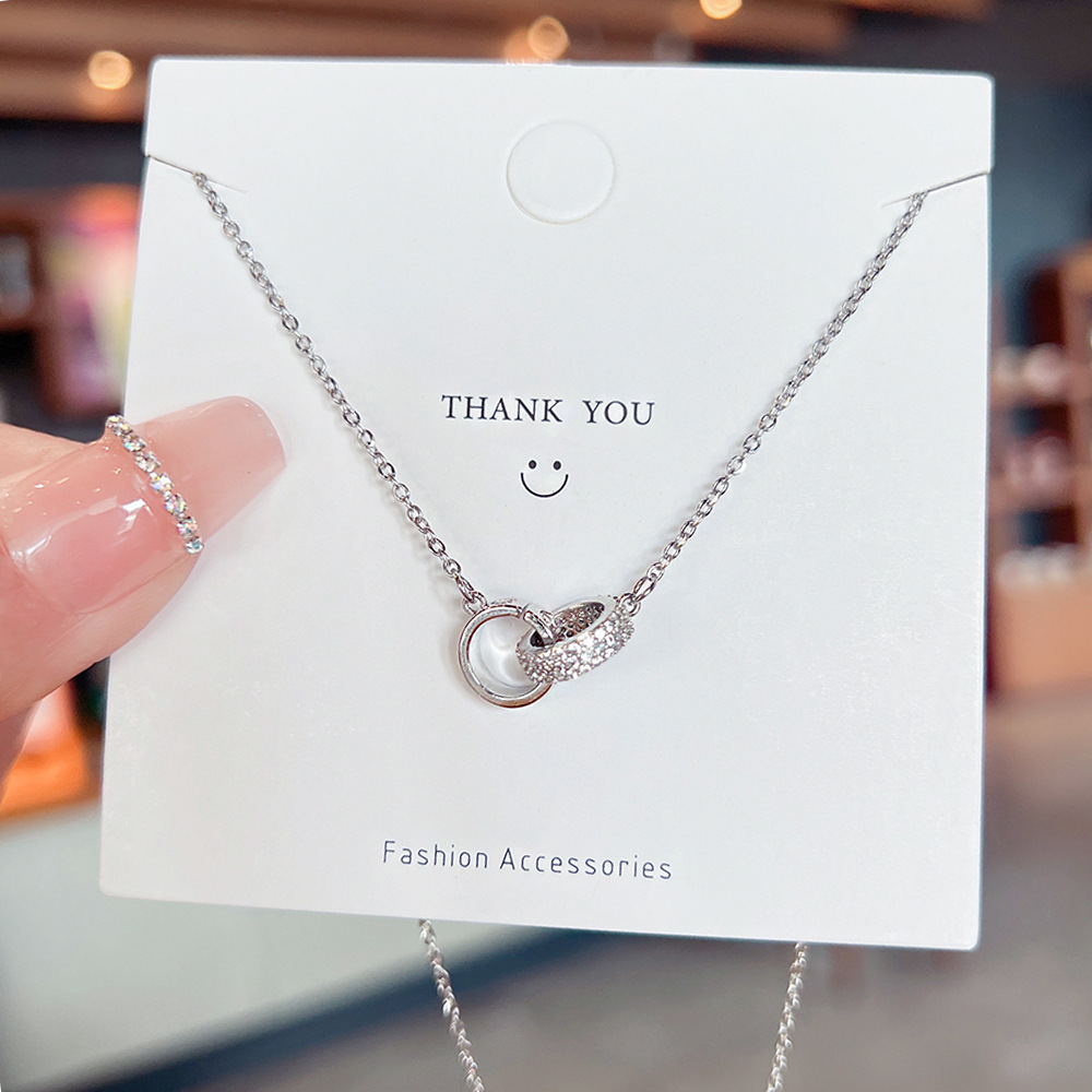 New concentric ring necklace, sweet and cool style, simple and light luxury, niche design sense, best-selling collarbone chain titanium steel jewelry wholesale full figure
