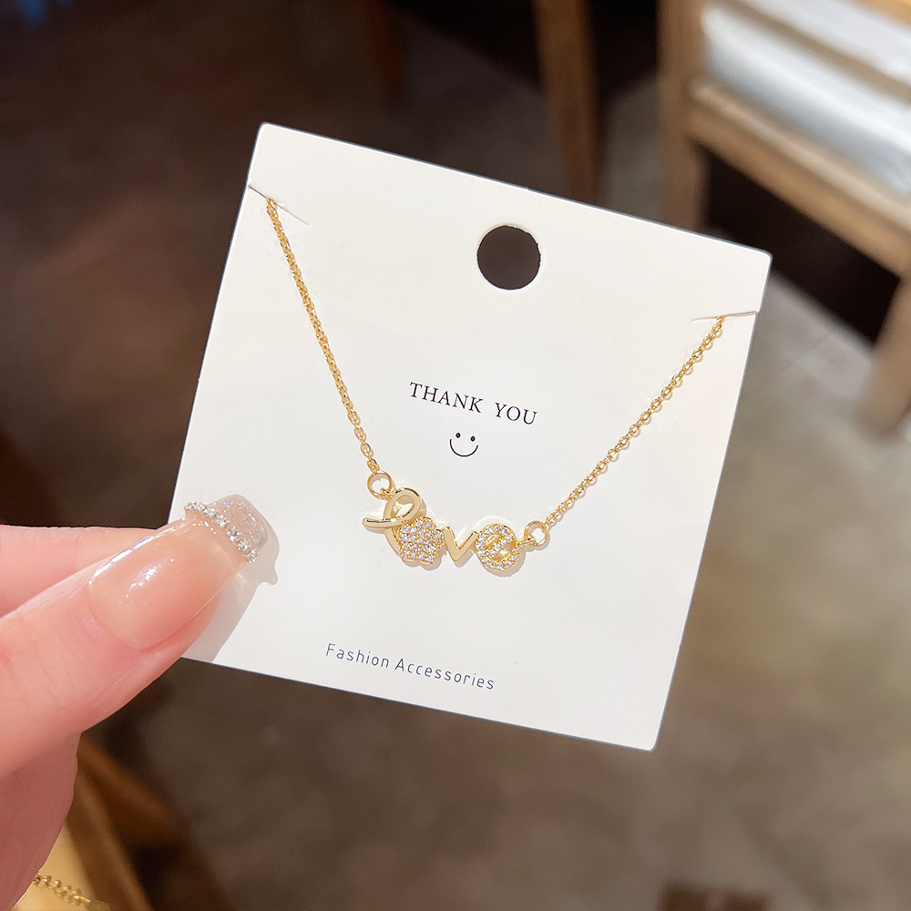 New trendy LOVE letter Internet celebrity necklace, spicy Korean style simple pendant, elegant titanium steel collarbone chain, ins accessories Application Scenario