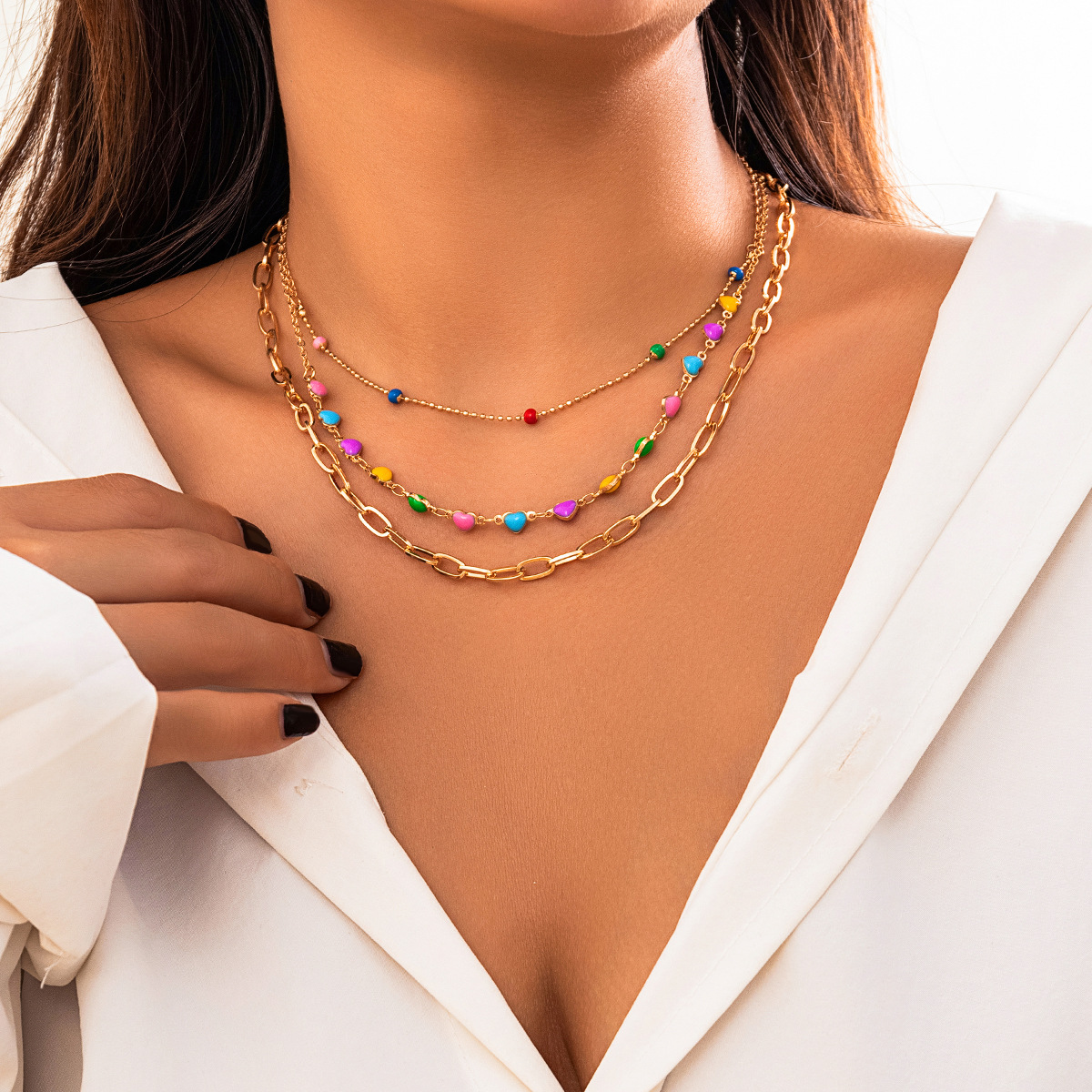 A cross-border colorful dopamine necklace for women from Europe and America, with a unique design of layered oil drops and butterfly-eye collarbone chain Specification drawing