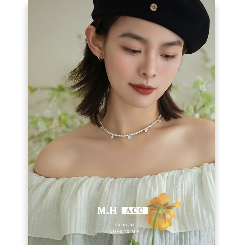 The new design of the star-shaped tassel pearl necklace for women, with a Korean style and ins style, is simple, fashionable and versatile. Wholesale of collarbone chains details Picture