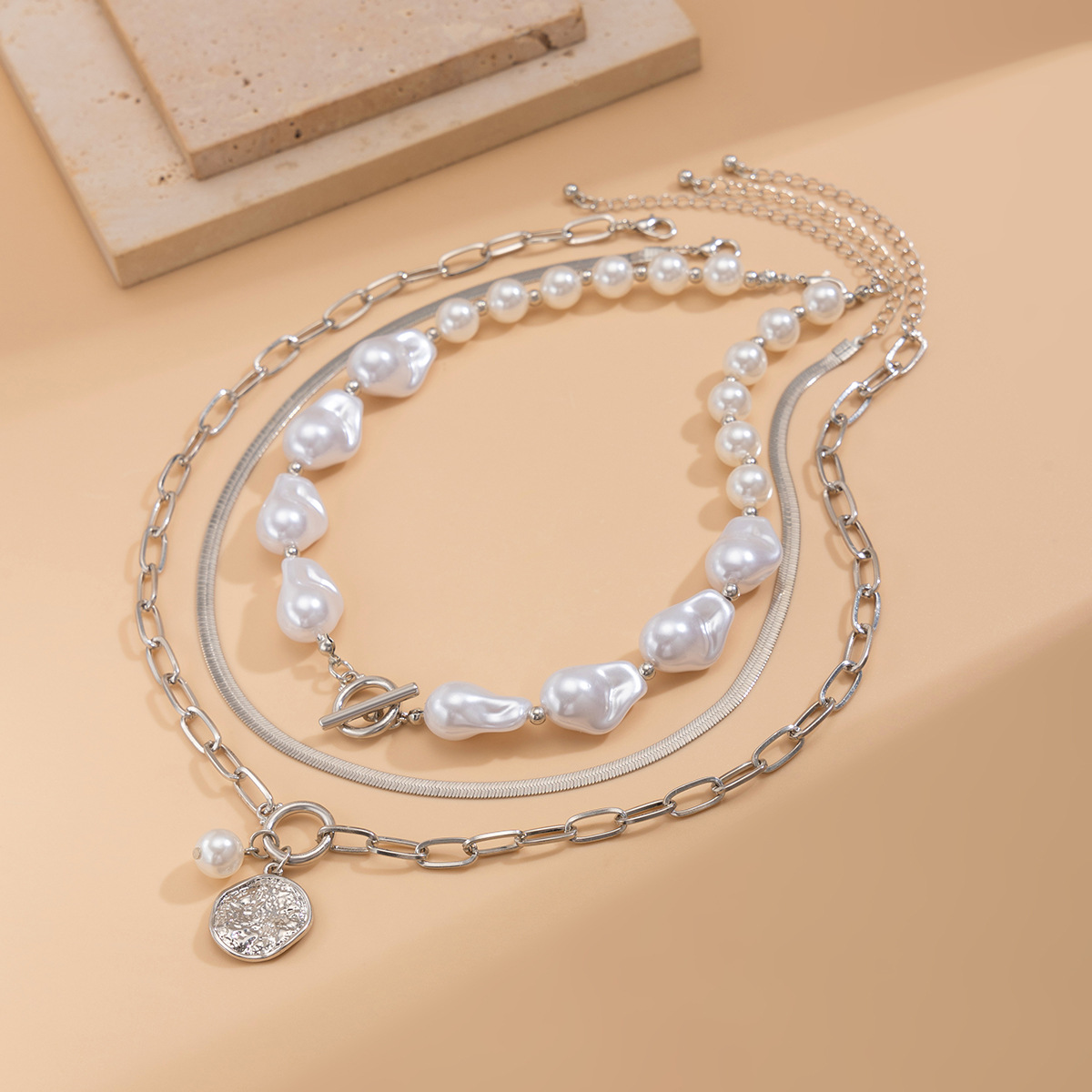 European and American cross-border jewelry, Baroque irregular-shaped pearl collarbone chain, retro metal feel round piece pendant, multi-layer necklace Application Scenario