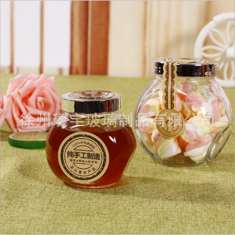 Glass flat-bone storage jar, sealed bottle, candy flower tea jar, honey wedding candy bottle, honey bottle, liquid storage bottle full figure
