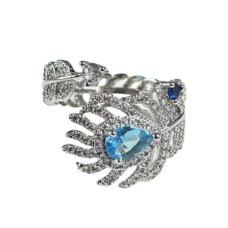 A niche design sense sea-blue zircon feather open ring for women, adorned with diamonds, a fashionable, individualistic and light luxury ring from Europe and America Item Picture