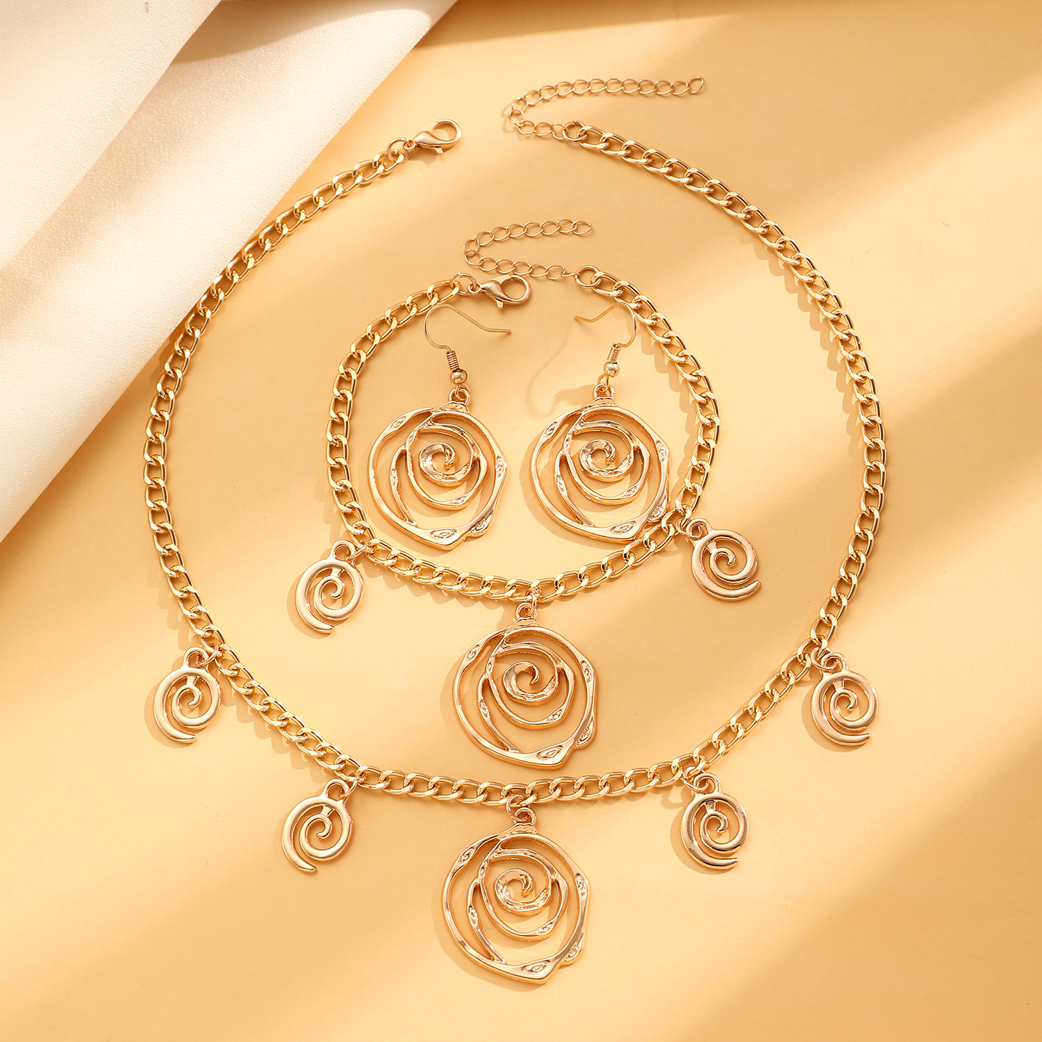 European and American cross-border jewelry, exaggerated flower vortex earrings, bracelet, necklace, three-piece jewelry set, high-end look for women Specification drawing