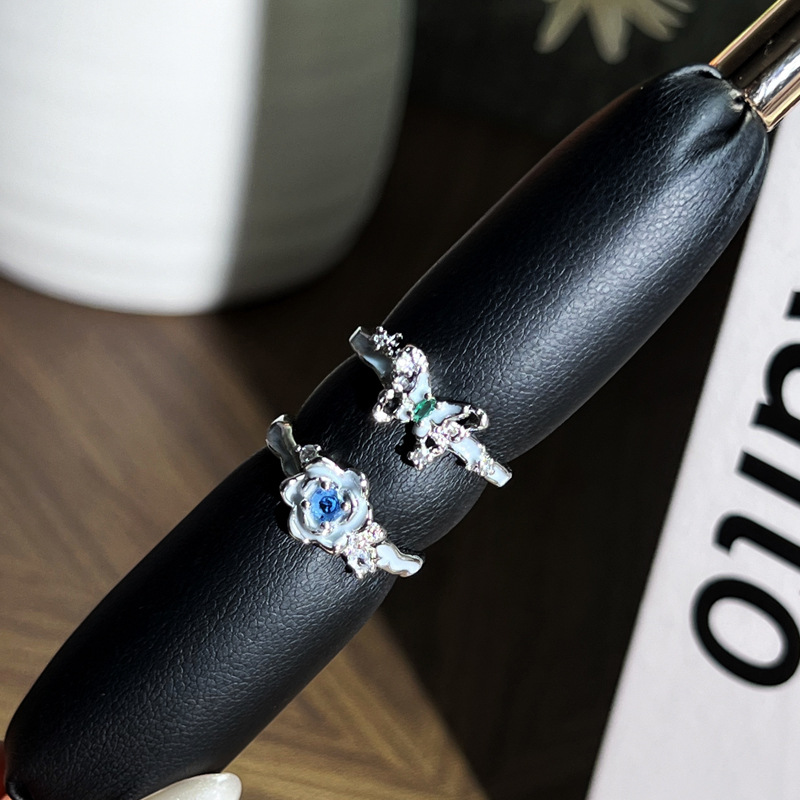 Elegant jasmine blue diamond butterfly couple ring, with unique enamel flowers, exquisite and niche design sense, high-end ring Application Scenario