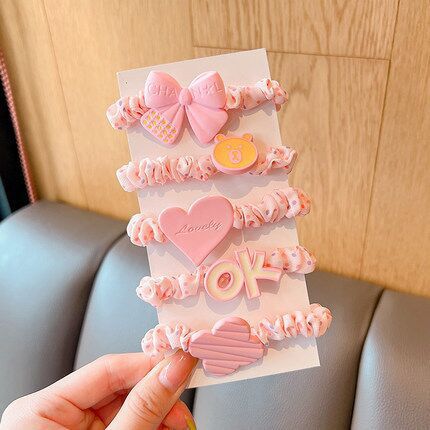 Wholesale of Korean-style colorful children's hair-safe, simple flower hair bands, cute small intestine rubber bands for girls, and hair ties for young girls Application Scenario