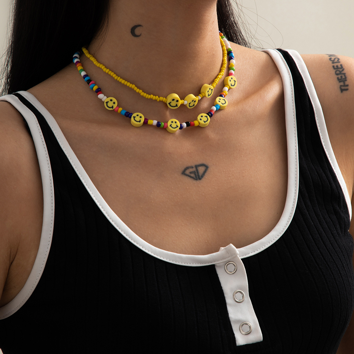 Simple and colorful rice bead chain necklace from Europe and America, elegant and stylish yellow smiling face jewelry set details Picture