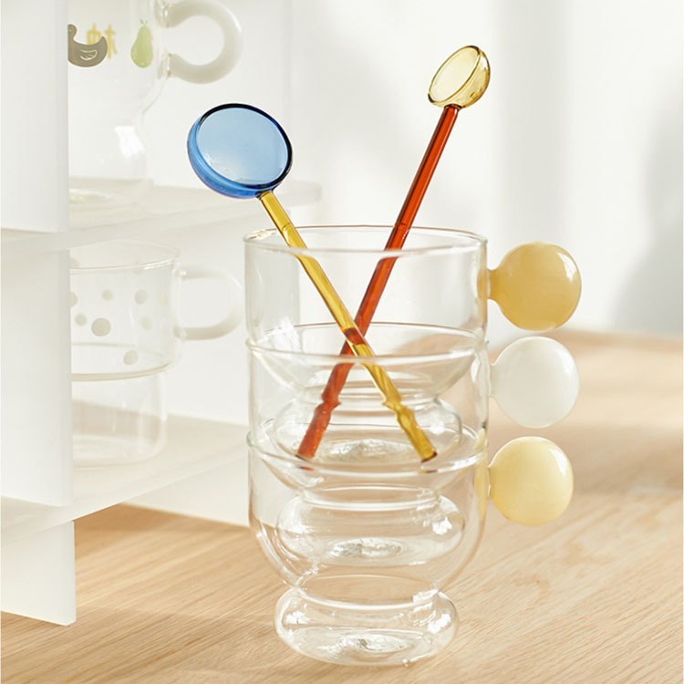 Cute spherical glass cup, high borosilicate transparent single-layer cup, ins style household, high appearance level milk juice cup with handle Application Scenario