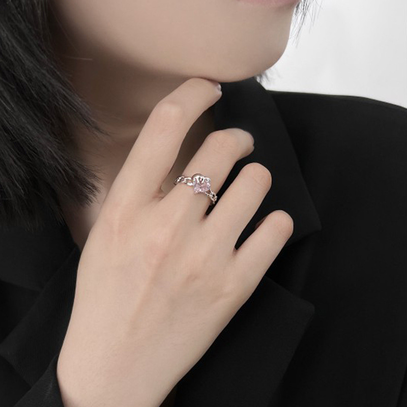 The liquid pink heart-shaped ring for girls features a sweet and cool, niche design. It's a Korean-style ring with an adjustable opening for the index finger Specification drawing