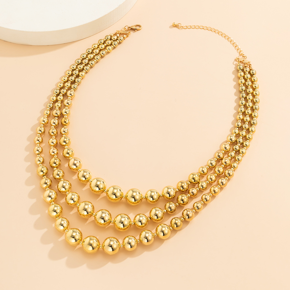 An exaggerated multi-layered geometric round bead collarbone chain from Europe and America, a hip-hop sweet and cool style mixed and matched woven necklace Application Scenario
