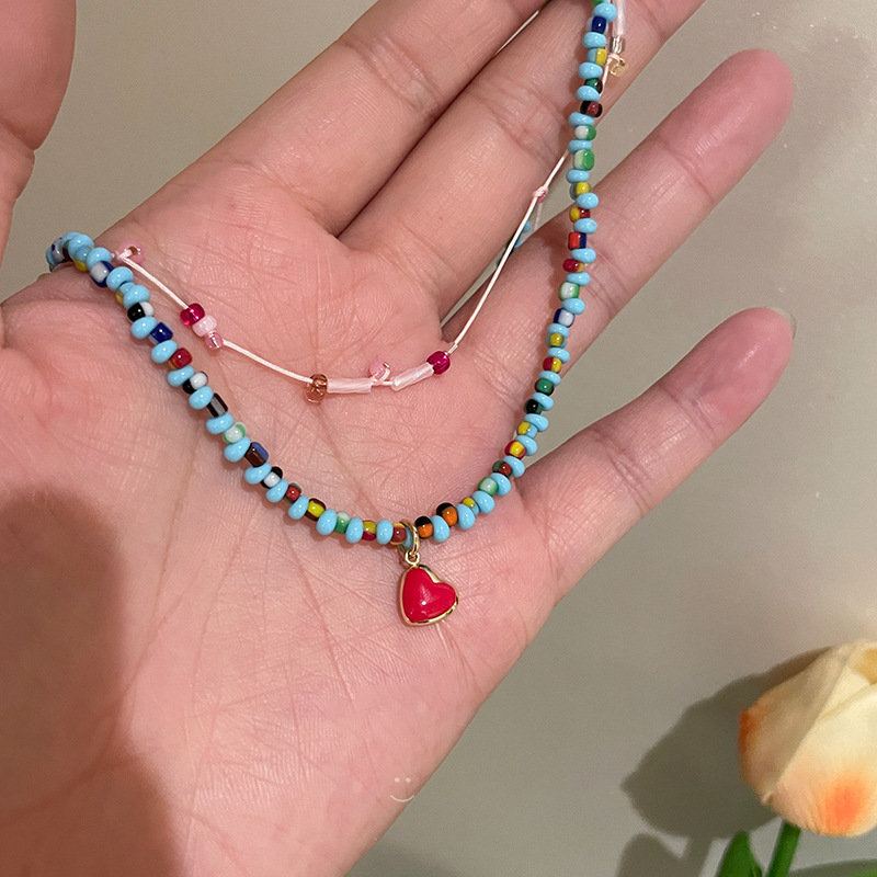 Summer new blue beaded necklace, red heart niche collarbone chain, unique design sense, Instagram-style Korean version for girls ~ Application Scenario