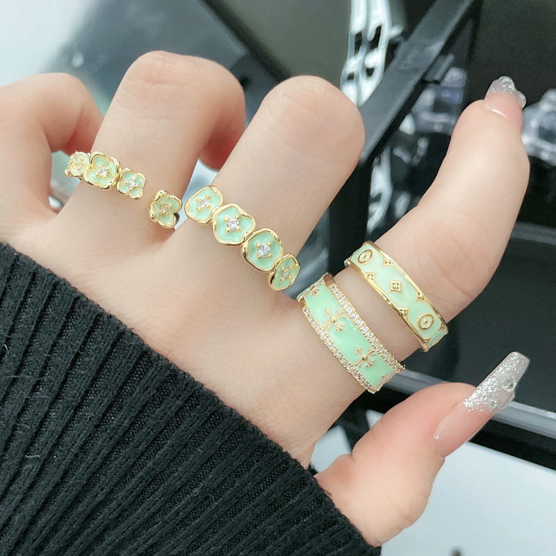French light luxury Mambo style mint green drip glaze flower open ring, a geometric high-end and elegant fashionable ring for women full figure
