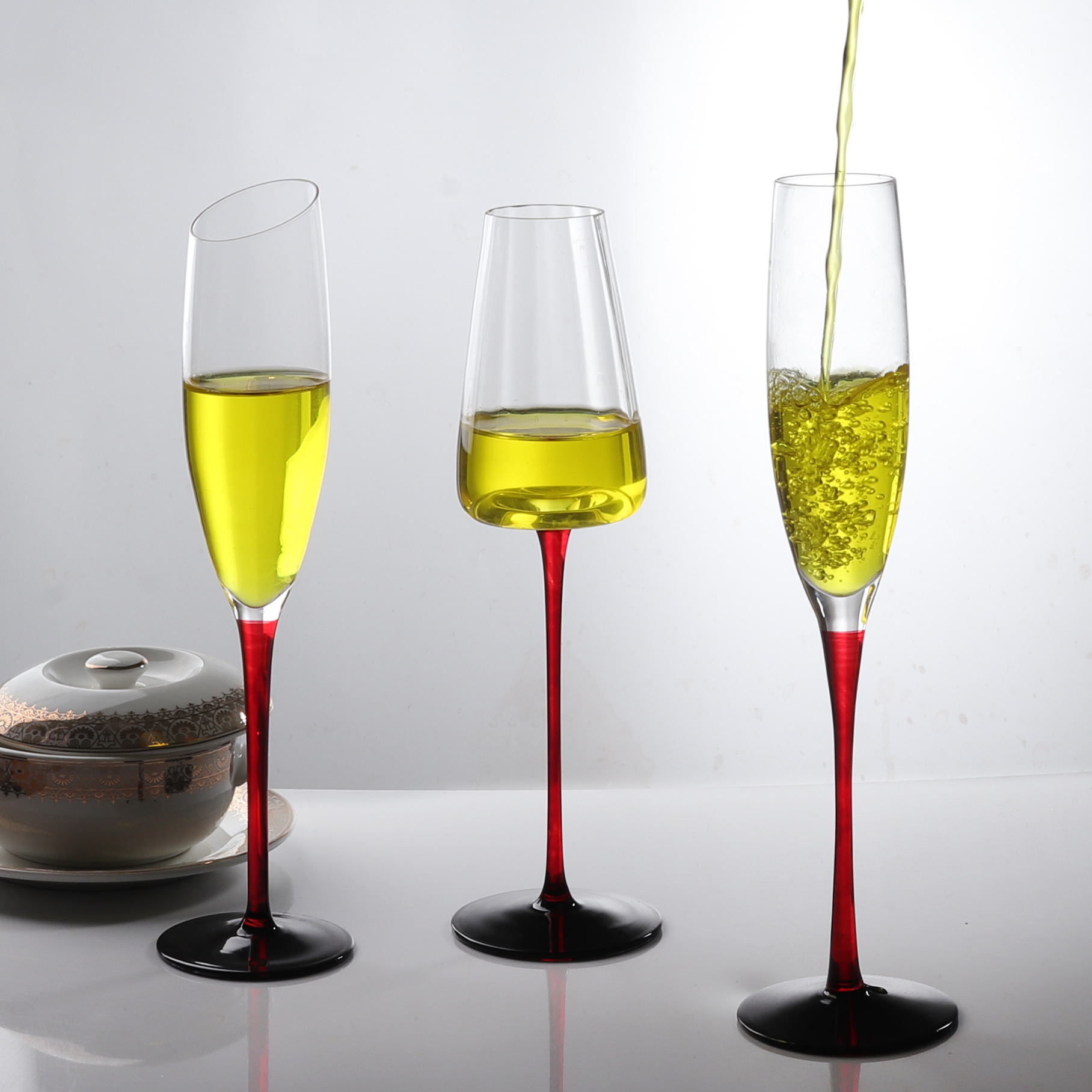 Two sets of household red and black background champagne glasses, crystal concave bottom striped champagne glasses, slanted high-footed crystal glasses details Picture